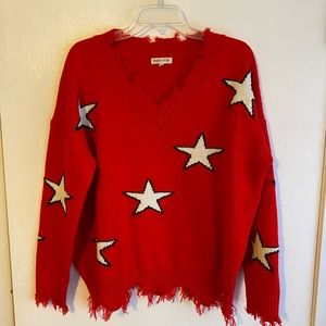 Red star v-neck sweater